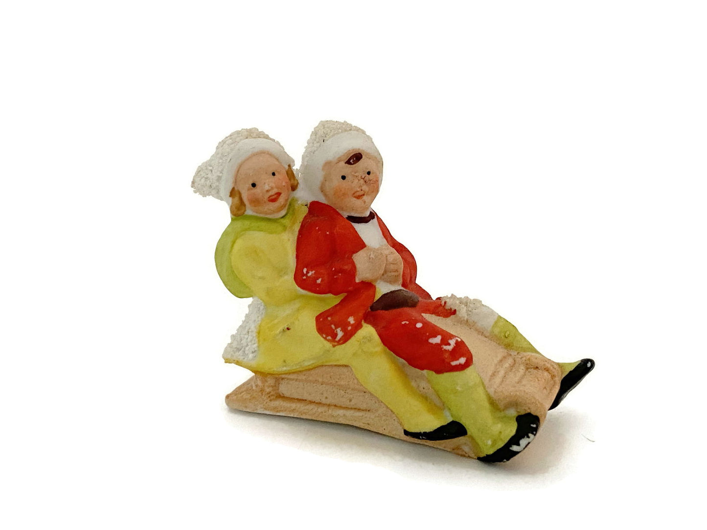 Antique Hertwig German Bisque Porcelain Sledding Figurine at Duckwells