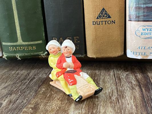 Antique Hertwig German Bisque Porcelain Sledding Figurine at Duckwells