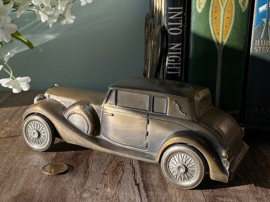 Vintage Rolls Royce Automobile Cast Metal Coin Bank at Duckwells