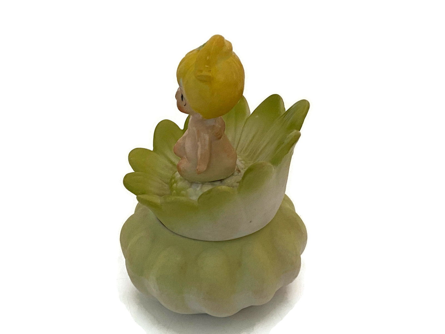 Midcentury Ceramic Flower Dresser Jar with Baby Sitting Atop at Duckwells