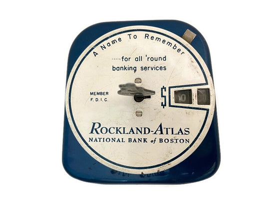 RL. Midcentury Advertising Add a Coin Bank at Duckwells