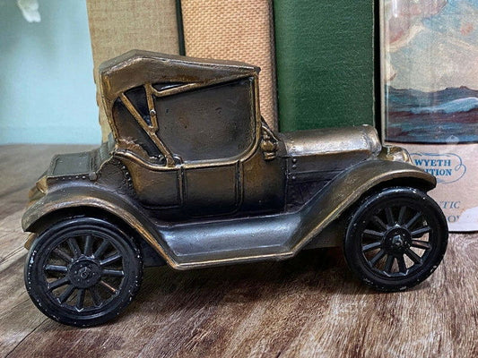 VIntage 1915 Car Cast Metal Coin Bank at Duckwells