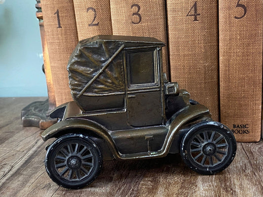 VIntage Car Cast Metal Advertising Coin Bank at Duckwells