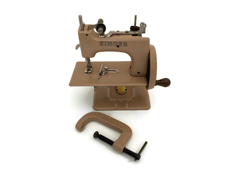 Image result for 1950s vintage pink singer sewing machine