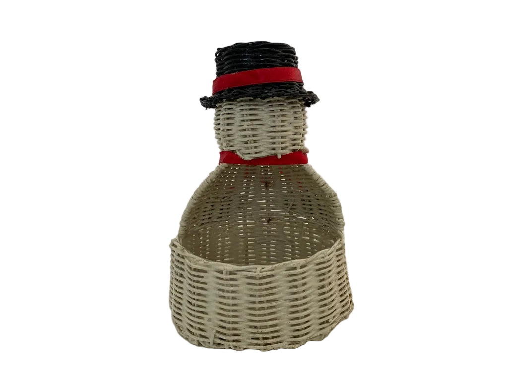 A decorative snowman figurine made from woven wicker, featuring a cream-colored body, a black top hat with a red band, and a red neck scarf, set against a plain light background.