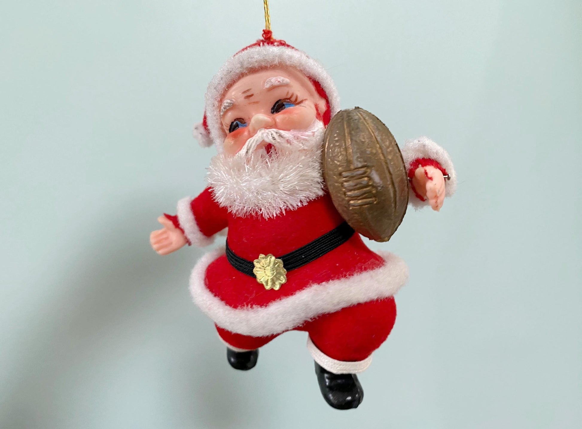 Vintage Santa Claus with a Football Hanging Ornament at Duckwells