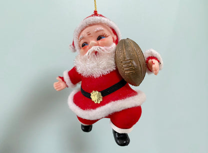 Vintage Santa Claus with a Football Hanging Ornament at Duckwells