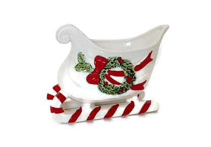Vintage Ceramic Sleigh with Red and Green Details at Duckwells