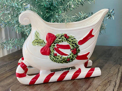 Vintage Ceramic Sleigh with Red and Green Details at Duckwells