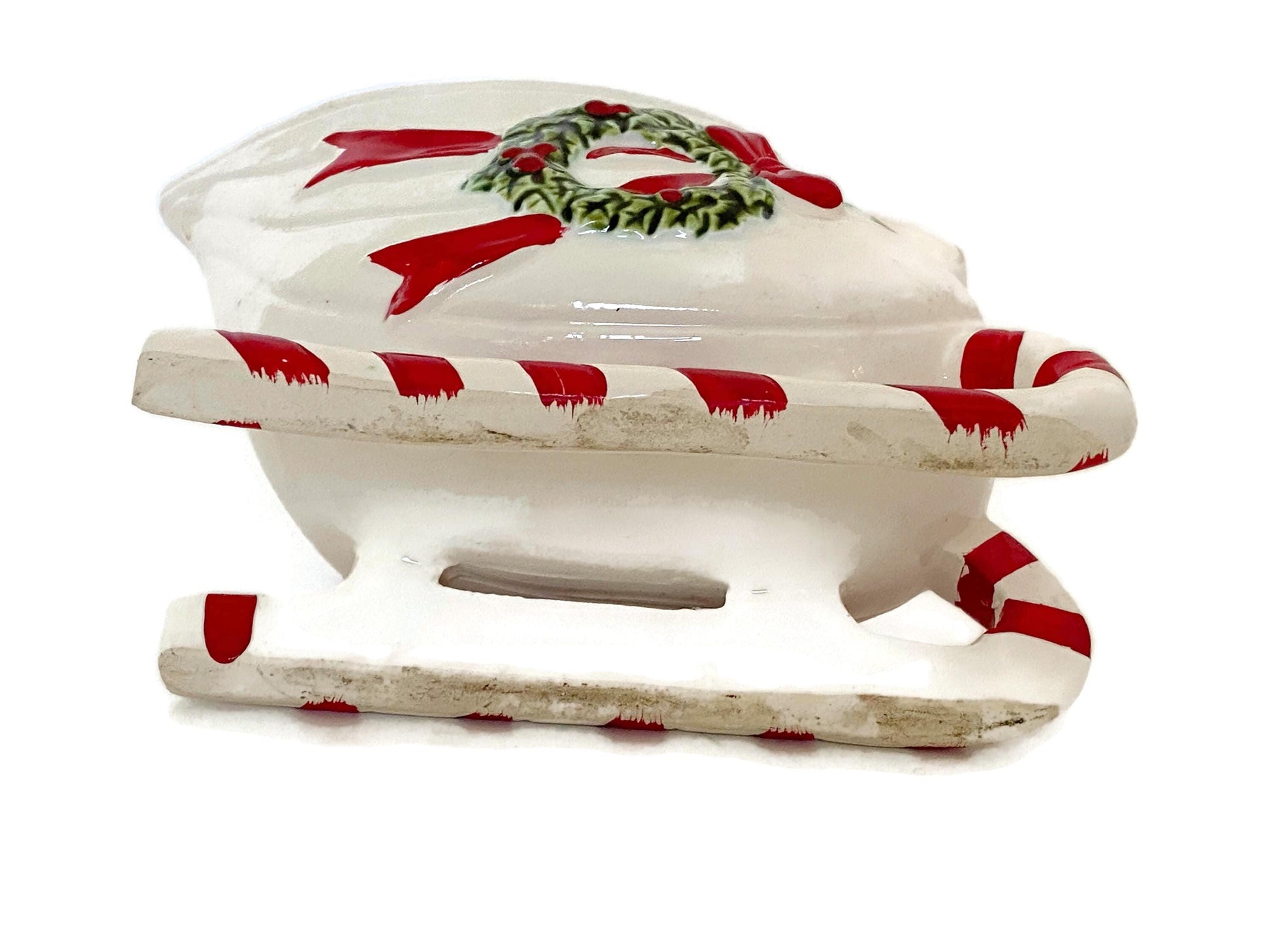 Vintage Ceramic Sleigh with Red and Green Details at Duckwells