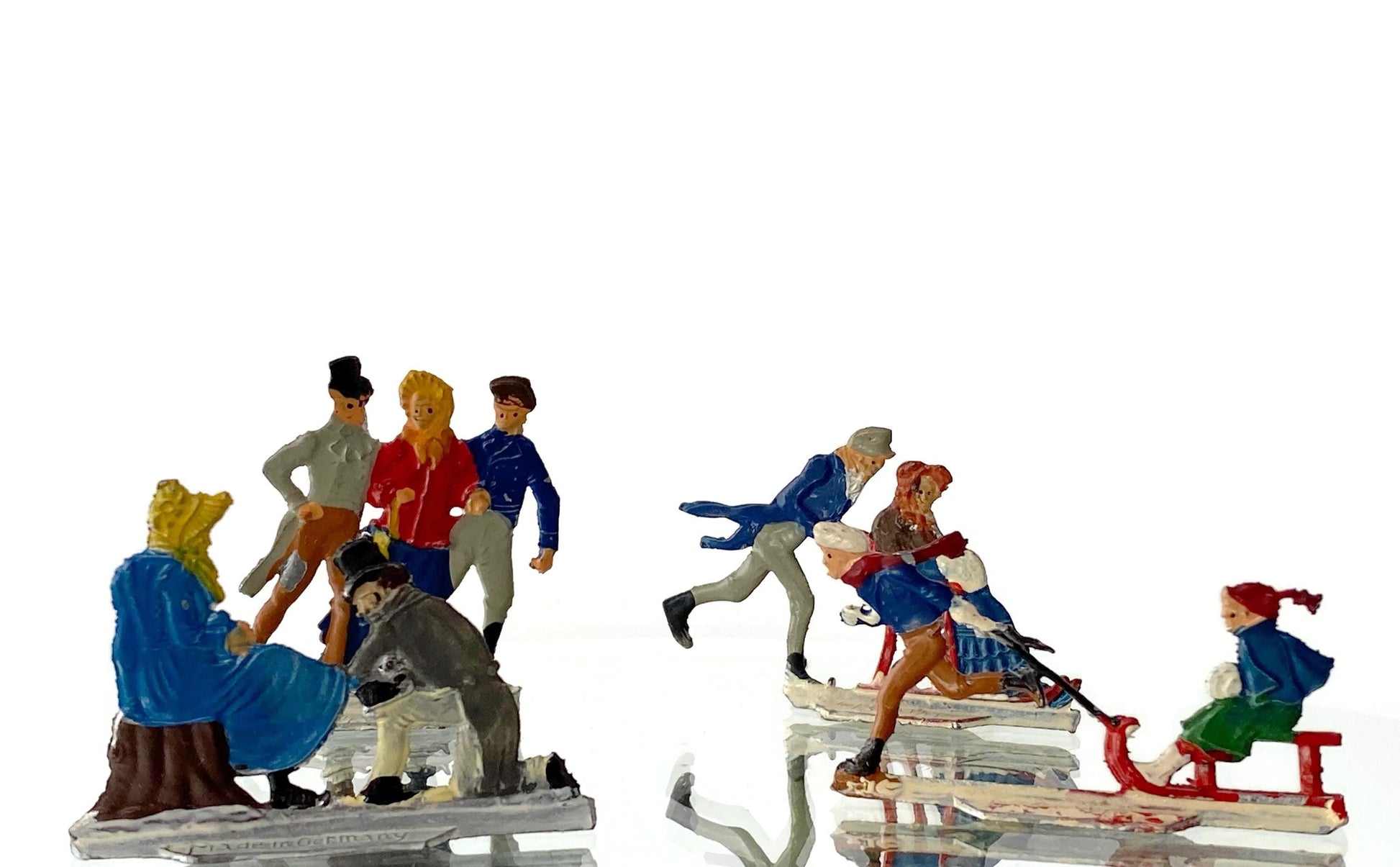 Antique Heinrichsen Skater Miniature Figurines at Duckwells