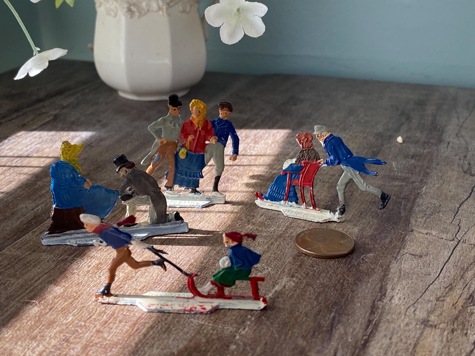 Antique Heinrichsen Skater Miniature Figurines at Duckwells