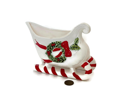 Vintage Ceramic Sleigh with Red and Green Details at Duckwells
