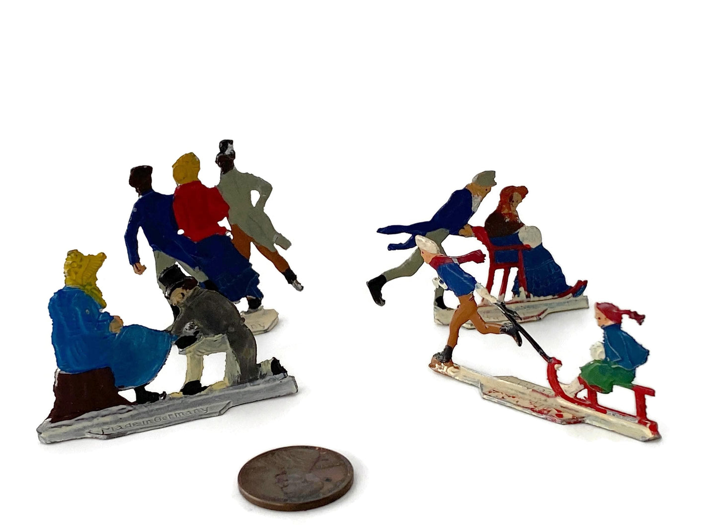 Antique Heinrichsen Skater Miniature Figurines at Duckwells