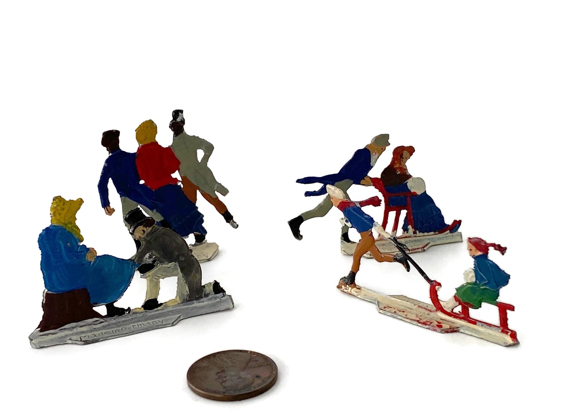 Antique Heinrichsen Skater Miniature Figurines at Duckwells