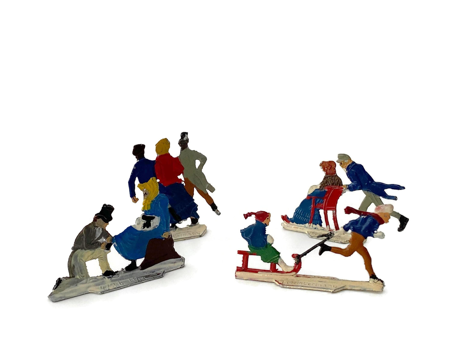 Antique Heinrichsen Skater Miniature Figurines at Duckwells