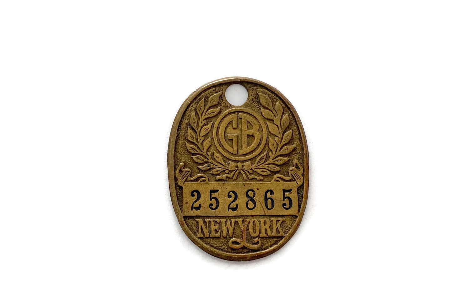Vintage Brass Charge Coin from Gimbels New York at Duckwells