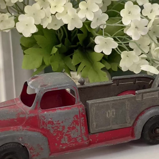 red and gray toy tow truck