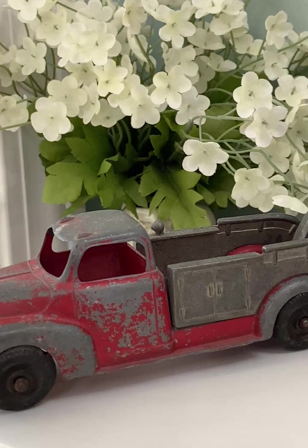 red and gray toy tow truck