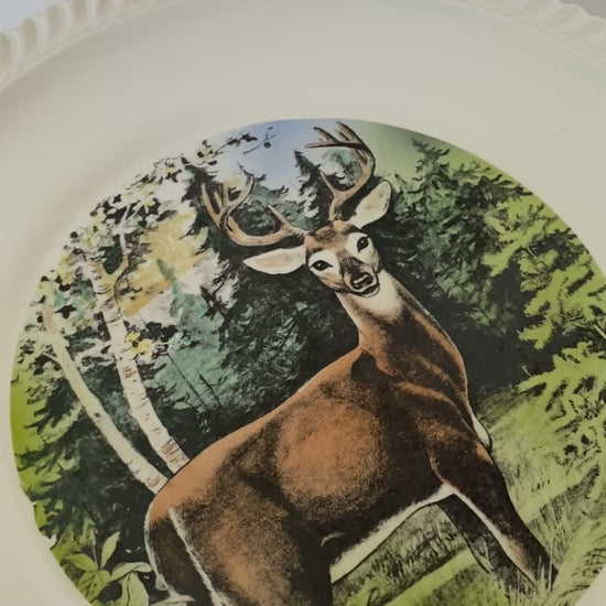 vintage ceramic plate with deer graphic