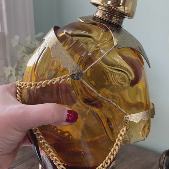vintage glass decanter shaped like a horse