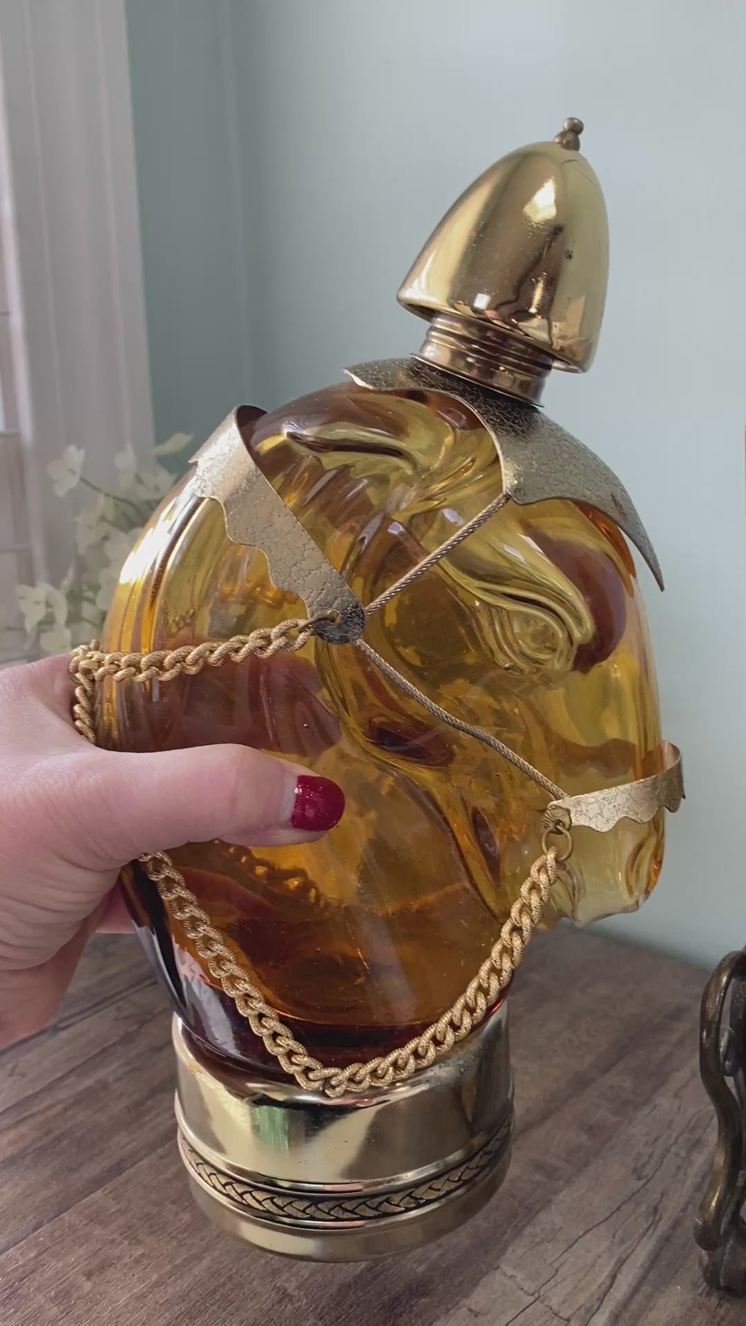 vintage glass decanter shaped like a horse