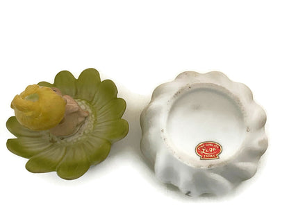 Midcentury Ceramic Flower Dresser Jar with Baby Sitting Atop - Duckwells