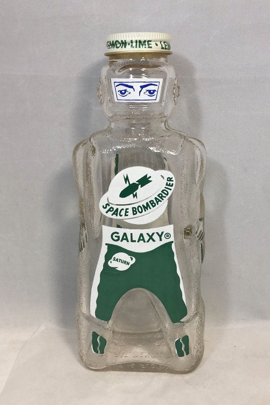Vintage Spaceman Glass Bank